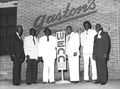 Radio executives outside Gaston's Lounge, c. 1980